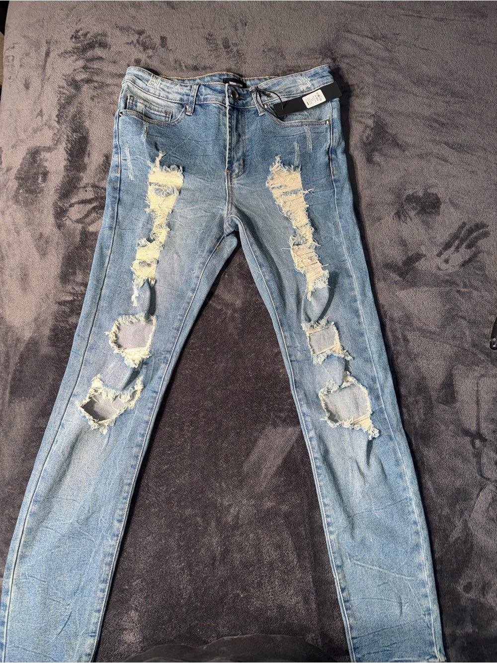 Distressed Medium Wash Skinny Jeans